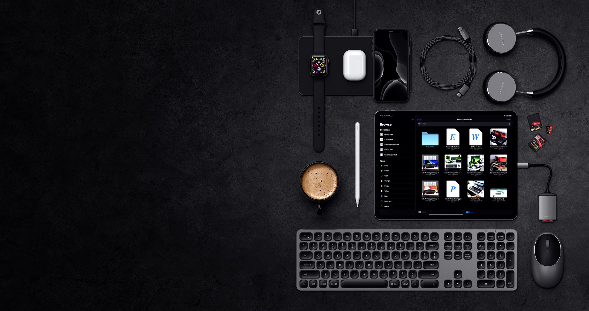 iPad Pro and space gray keyboard setup on gray background