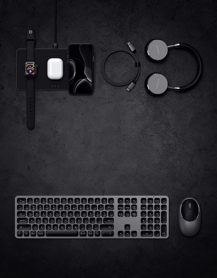 iPad Pro and space gray keyboard setup on gray background